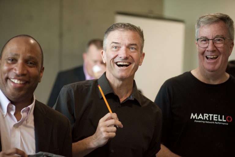 City Councillors Rawlson King and Tim Tierney, joined by Former Mayor and current OCH Foundation Board Member Jim Watson, share a light moment while speaking with media at the Pack-a-Thon media event.